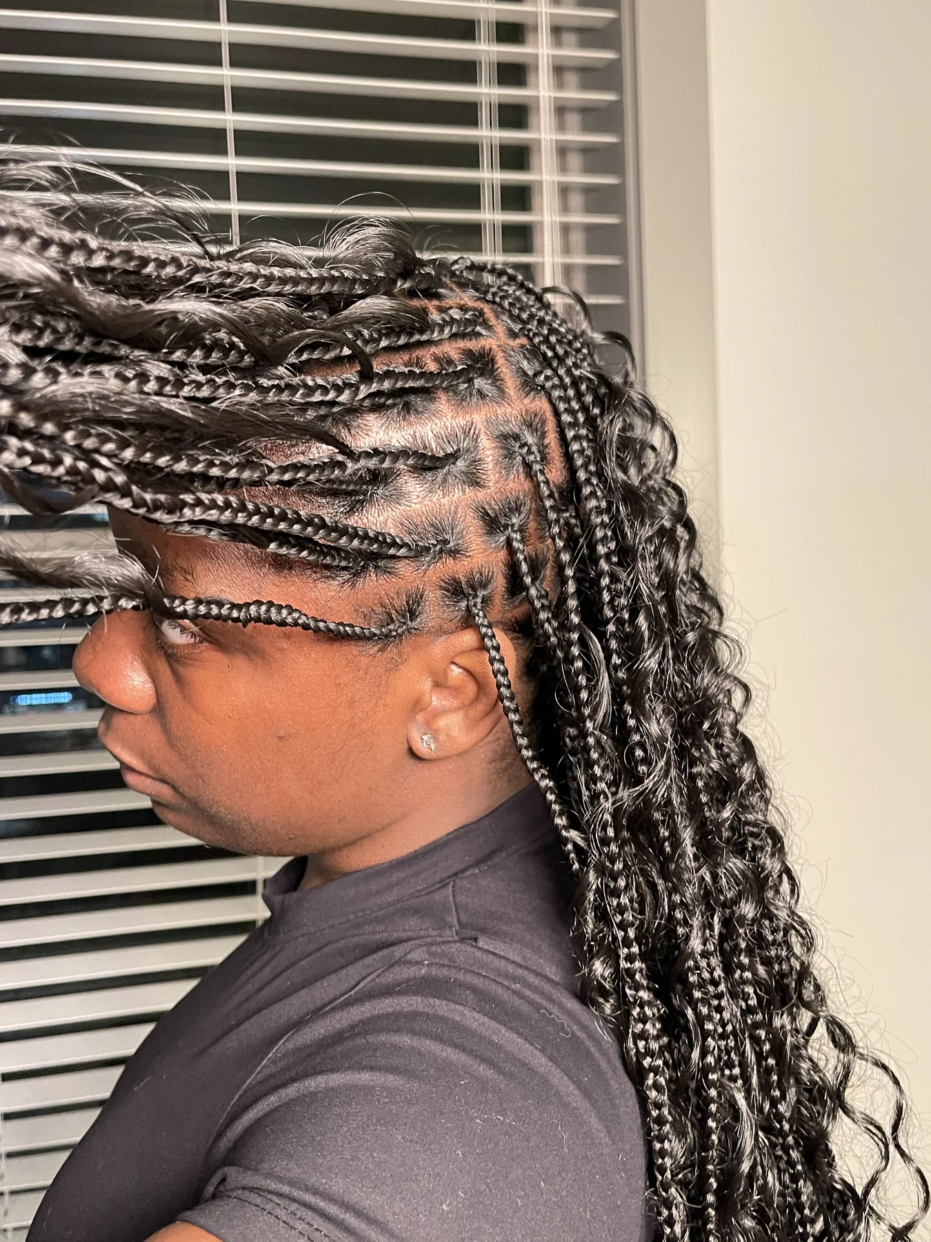 Close-up of clean braid parting and curls