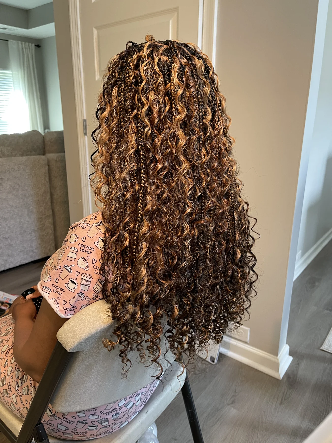 Close-up of neat knotless braids with clean parting